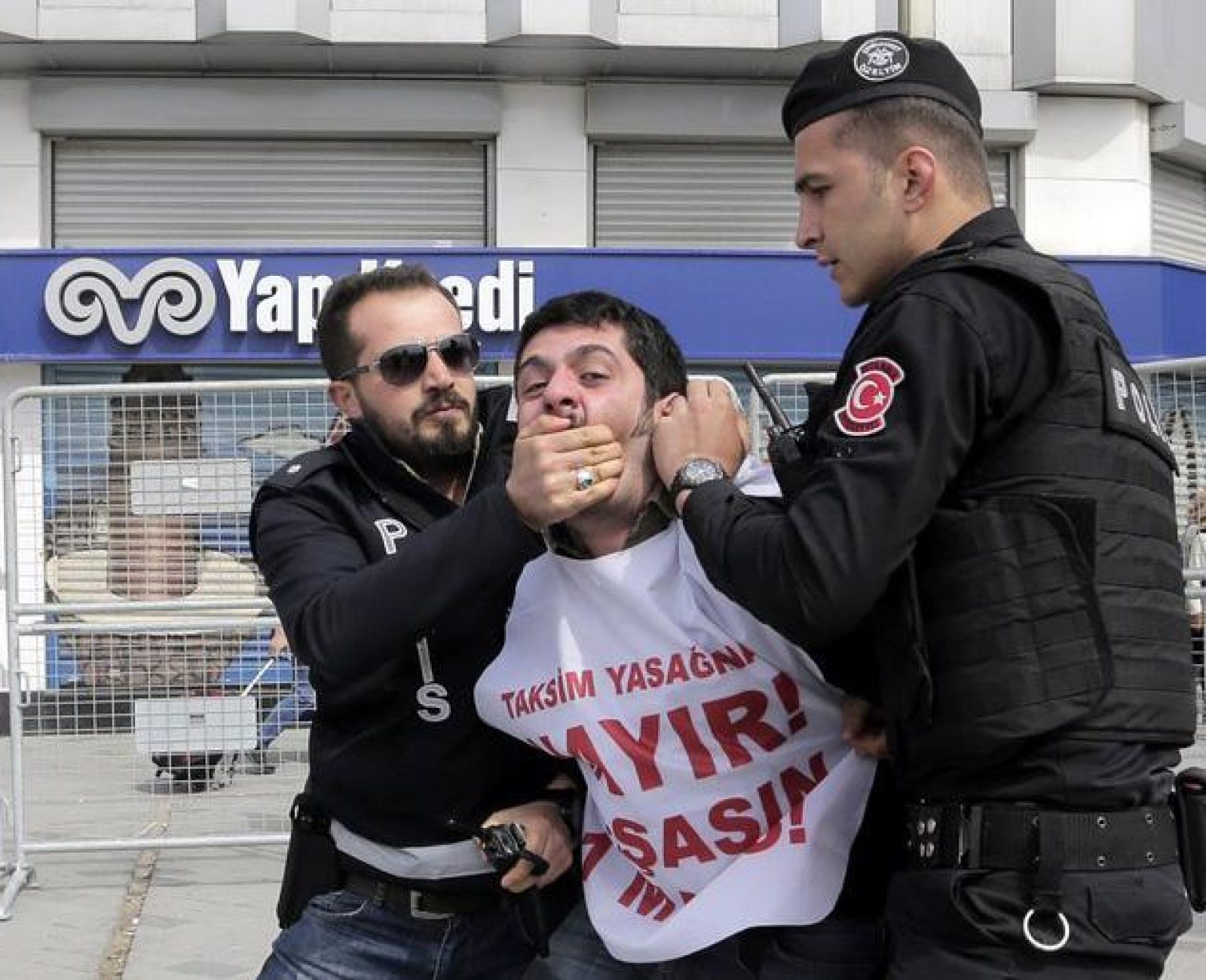 epa05938280 Turkish riot police arrest a protester who tried to reach Taksim Square for a May Day celebration, in Istanbul, Turkey, 01 May 2017. According to reports, Turkish police imposed tight security measures around Taksim Square after interior ministry denied permits for celebrations to mark Labors Day in the square. Labour Day or May Day is observed all over the world on the first day of the May to celebrate the economic and social achievements of workers and fight for labourers rights.  EPA/CEM TURKEL